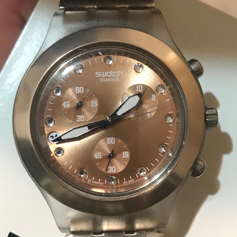 Swatch rose gold watch